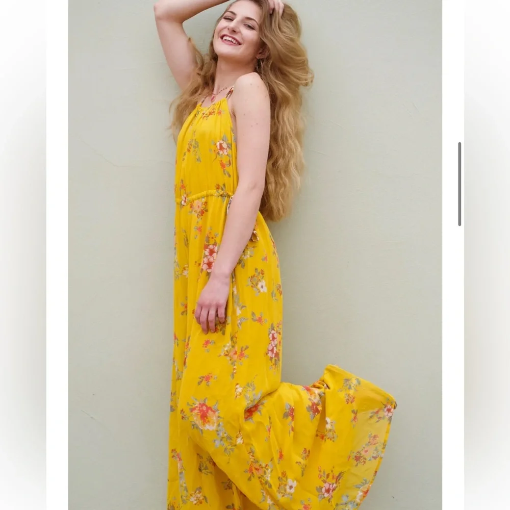 Free people - Georgia Yellow floral jumpsuit size XS( flaw)